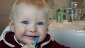 Toddler brushing teeth - allen pediatric dentistry